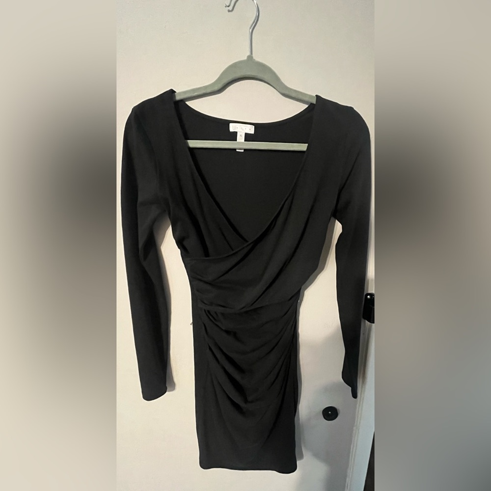 Woman’s black midi dress